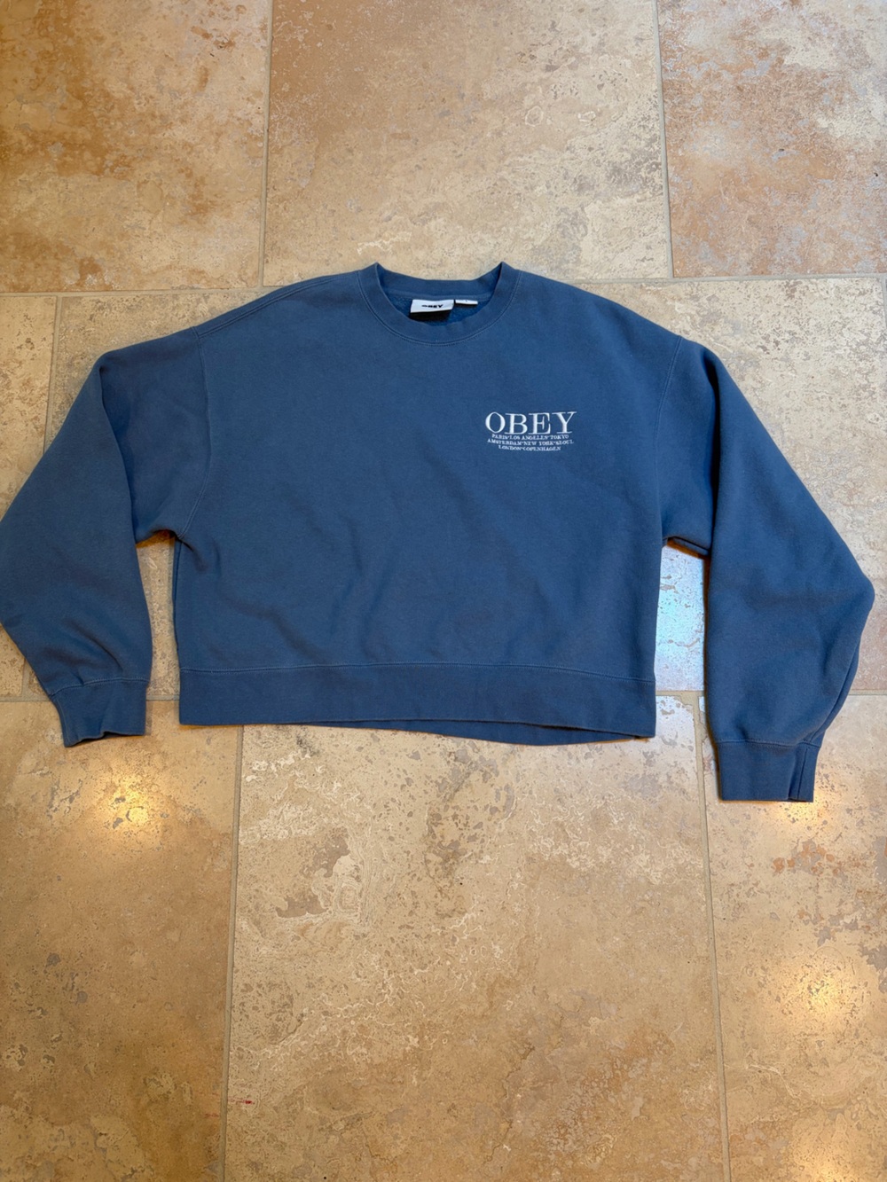 Obey women’s Slate Blue Crewneck cropped Sweatshirt with Chest Logo
